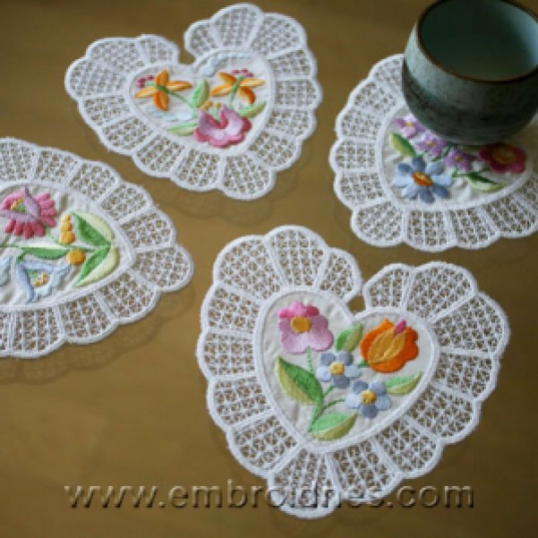 "Valentine’s Coasters" is a Free Valentine's Day Machine Embroidery Design designed by Julia from the Embroidered Necessity Blog!